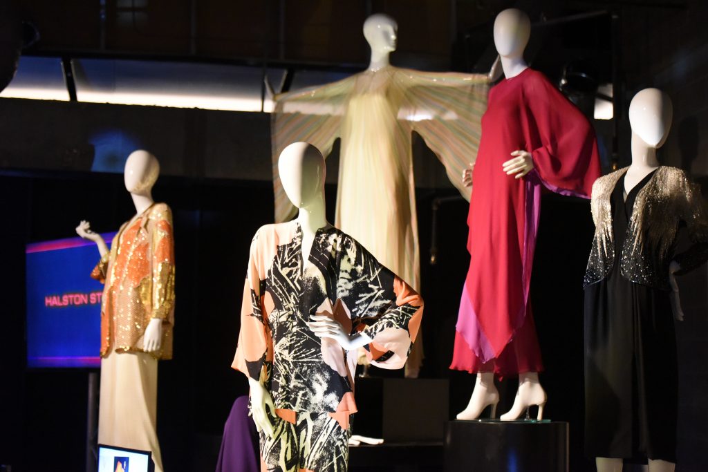 Mannequins in '70s designer dresses