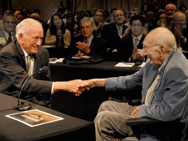 Dr. Denton Cooley and Dr. Michael DeBakey shake hands, 2007, in a historic evening in Houston. 