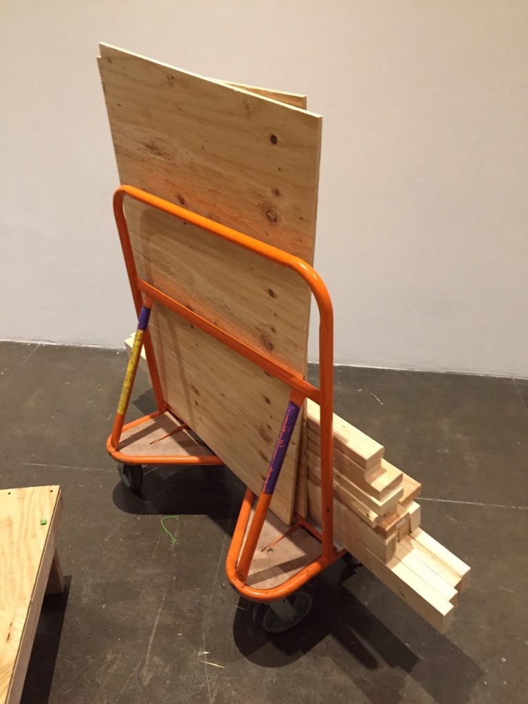 My handy-dandy studio assistant, an indispensable orange rolling cart, which helps me get lumber from the Artpace wood shop across Flores Street to the Artpace galleries.