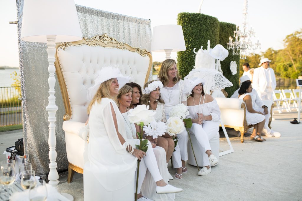 The dress code is head-to-toe white – shoes and accessories included. 