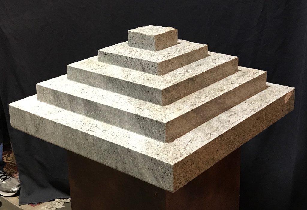 At Lewis & Maese Auction Co., a granite pyramid recalls Moroles' heroic commission for the Houston Police Officer Memorial. This granite sculpture is among the 200-some lots on the block Wednesday, November 15.