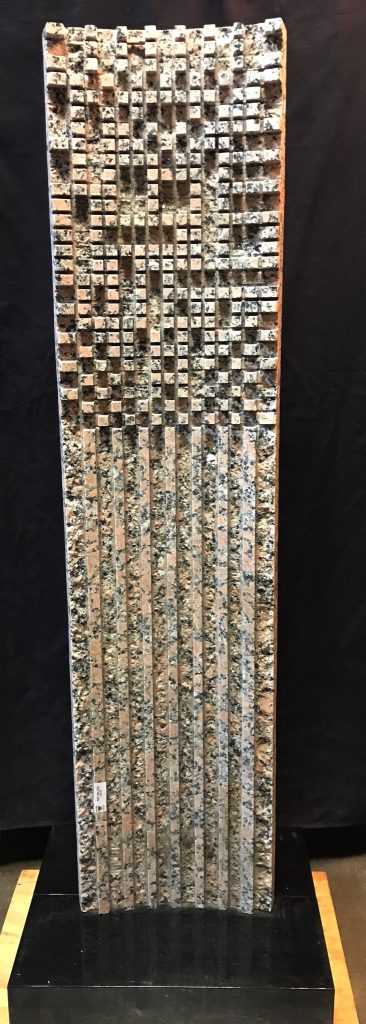 A classic Moroles granite stele will be one of the highlights of the Lewis & Maese auction.