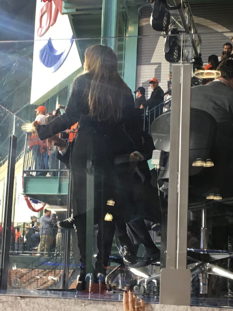 Jennifer Lopez rose up and cheered during the Astros' early four-run outburst in Game 3. (Photo by Jason Romano.)