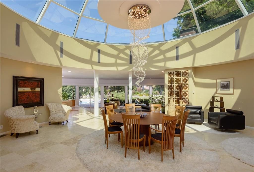The home features a dramatic 30-foot diameter skylight. 