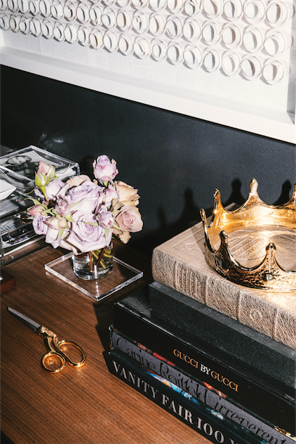 Droese's office is filled with books and magazines. 