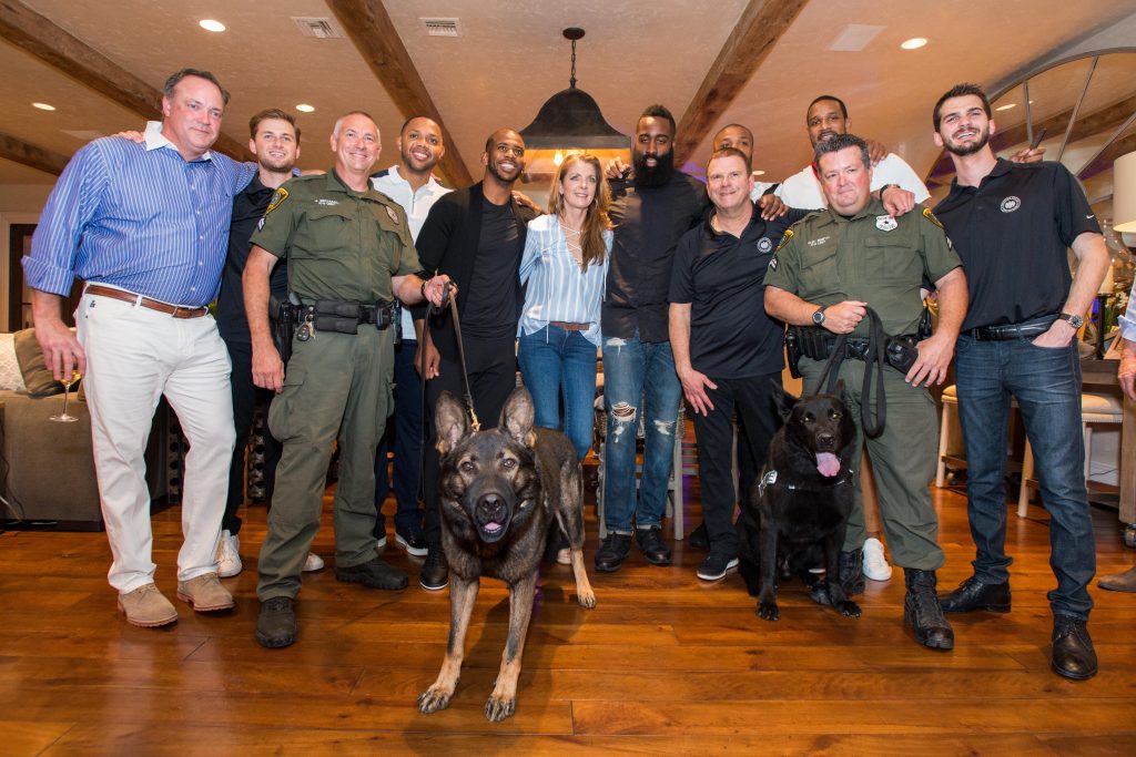Tad Brown, Patrick Fertitta, Officer Jeff Michael, Eric Gordon, Chris Paul, Paige Fertitta, James Harden, Tilman Fertitta, PJ Tucker, Trevor Ariza, Officer G.W. Smith, Michael Fertitta