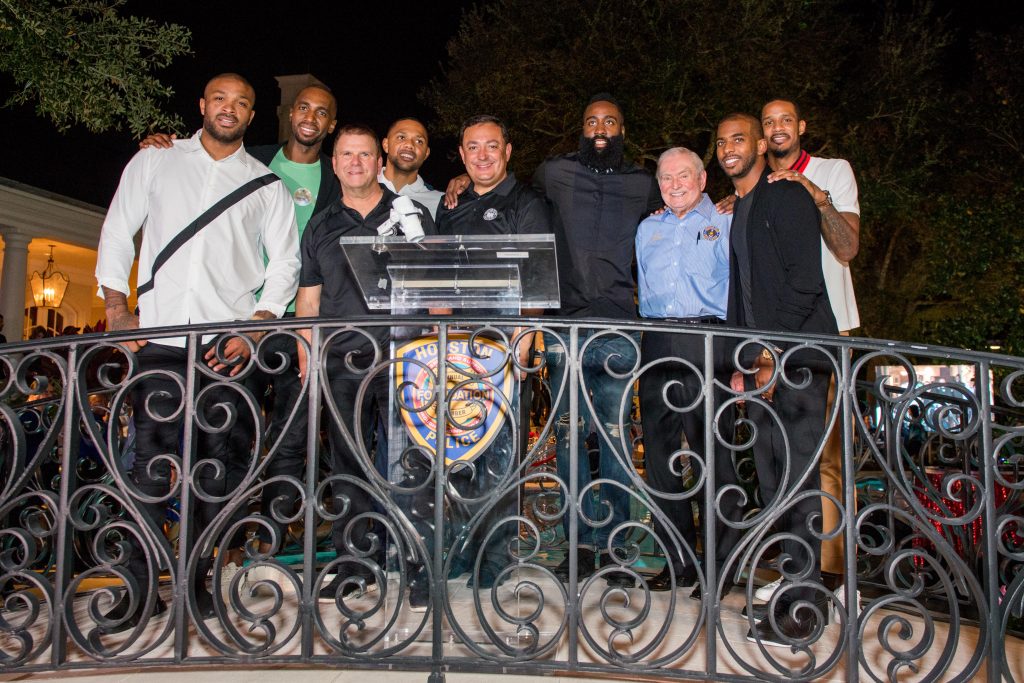 PJ Tucker, Luc Mbah A Moute, Tilman Fertitta, Eric Gordon, Chief of Police Art Acevedo, James Harden, Dave Ward, Chris Paul, Trevor Ariza