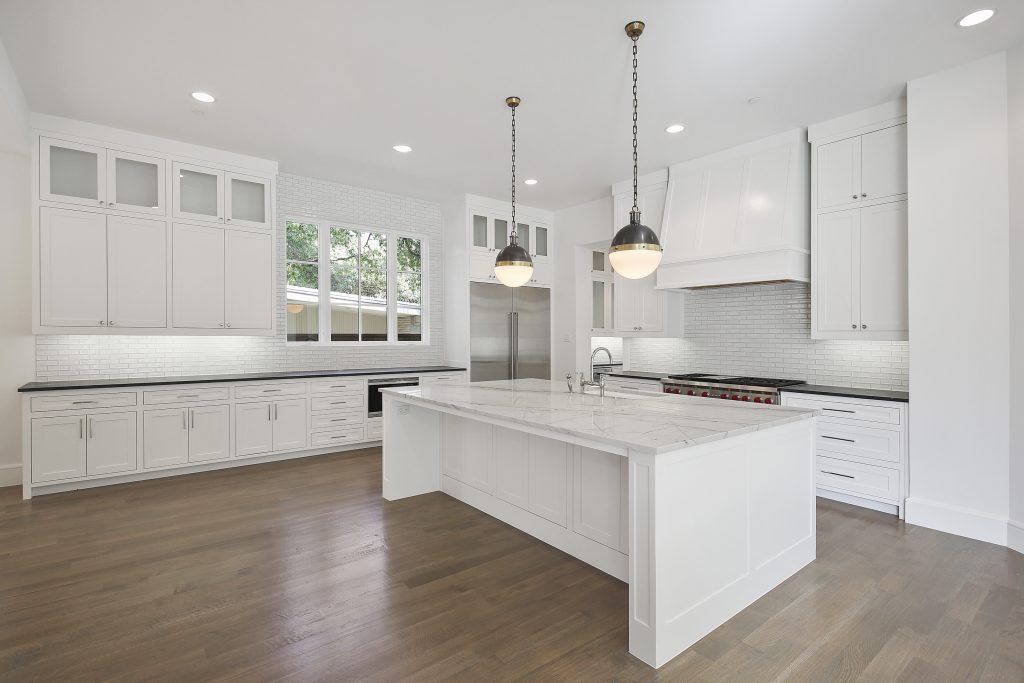 3715 Villanova's open kitchen creates a stunning space.