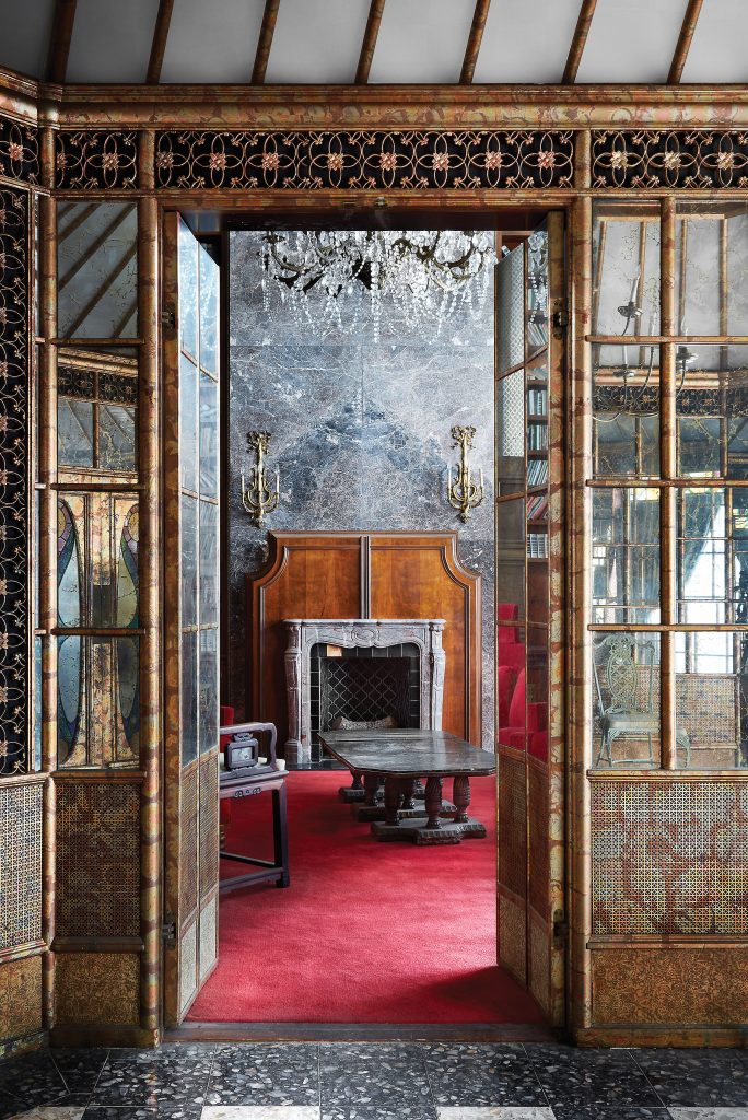Within the Hofheinz Suite, the Golden Bird Cage Dining Room leads into the Marble Library.
