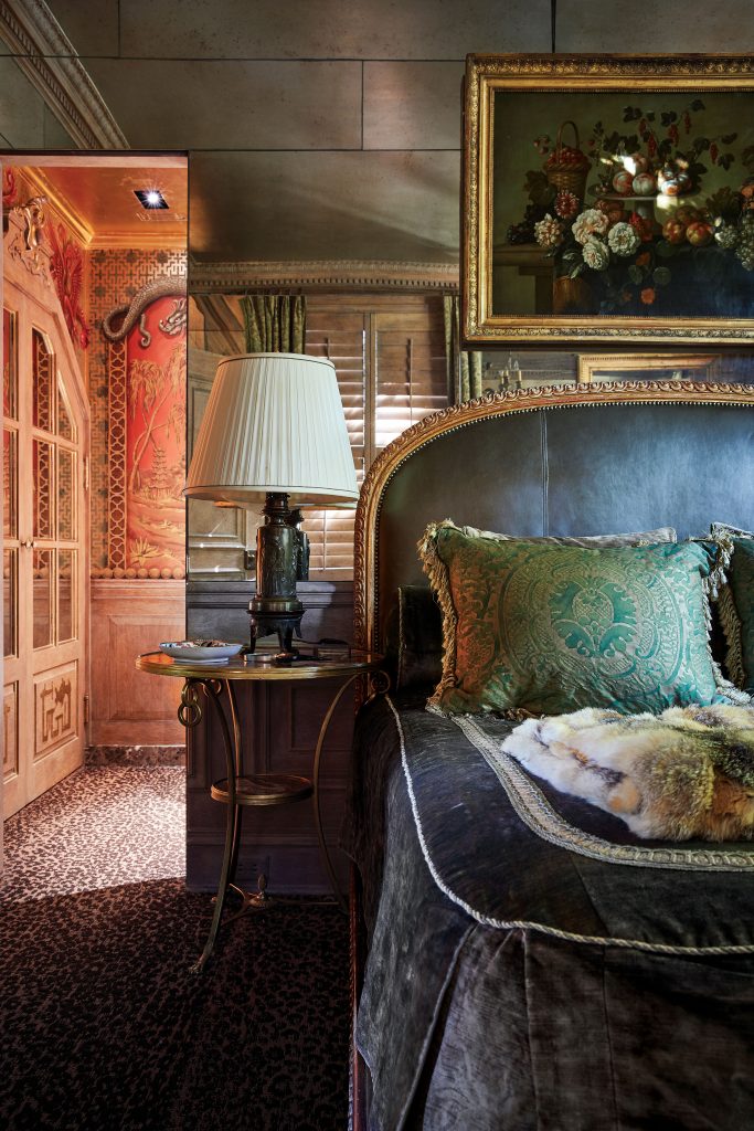 French 19th-century gilt wood-and-leather upholstered bed. Nineteenth-century painting from Paris.