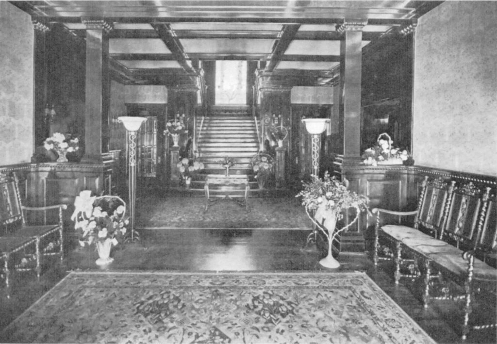 The home still has many of its original features, like the hand-carved woodwork. 