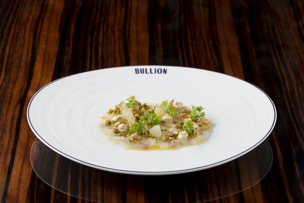 Fluke Crudo appetizer (green olive, pinenut cream, preserved lemon)