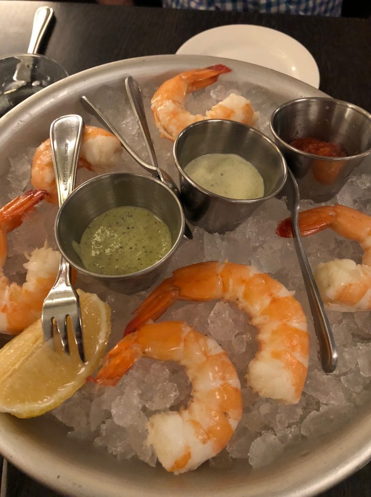 The shrimp at Le Politique are tender, briny, and served with some fine sauces.