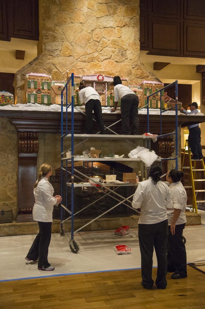 The Houstonian pastry team begins assembling the elaborate gingerbread display.