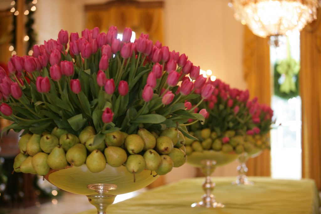 Holiday decorations in the Cross Hall and East Room at the George W. Bush Presidential Center.
