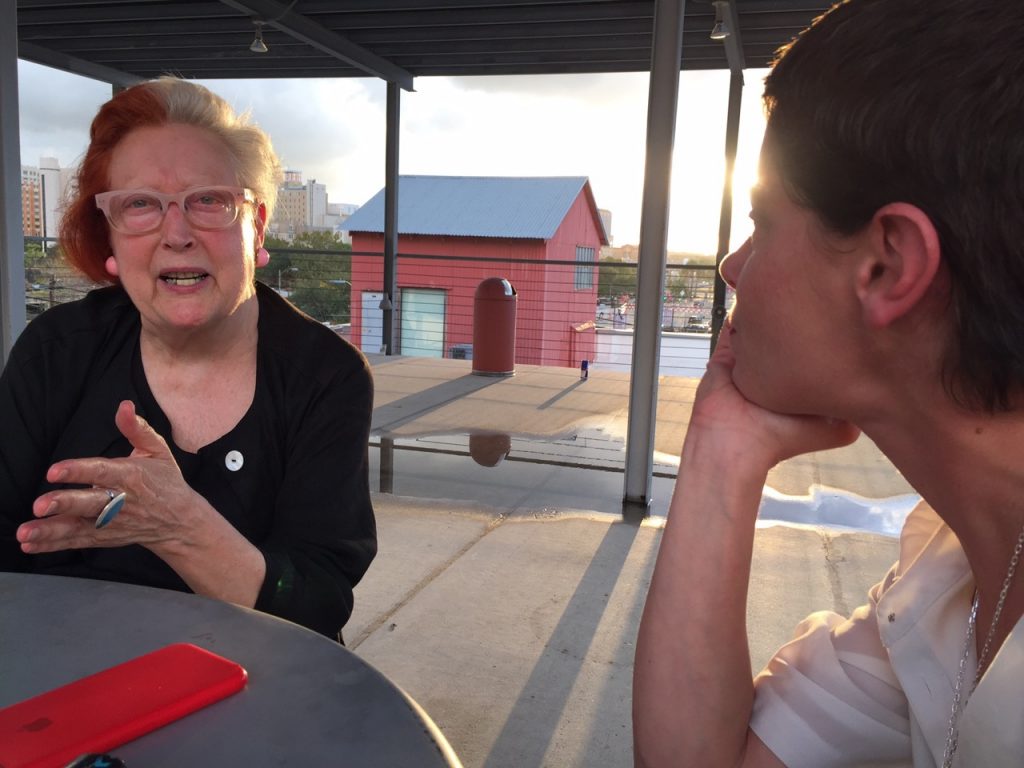 Fellow artists-in-residence Martha Wilson and Lili Reynaud-Dewar chill out on the roof deck of Artpace.