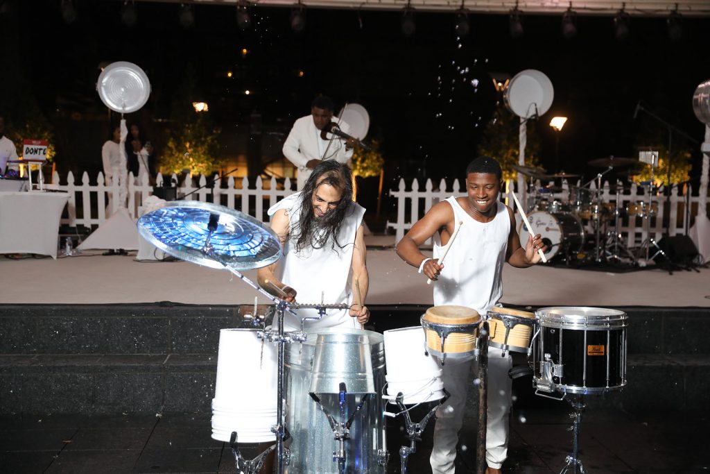 Surprise performers Richmond Punch, C. Sean Torres and Darius Hutson give Le Dîner en Blanc - Houston attendees an explosive performance