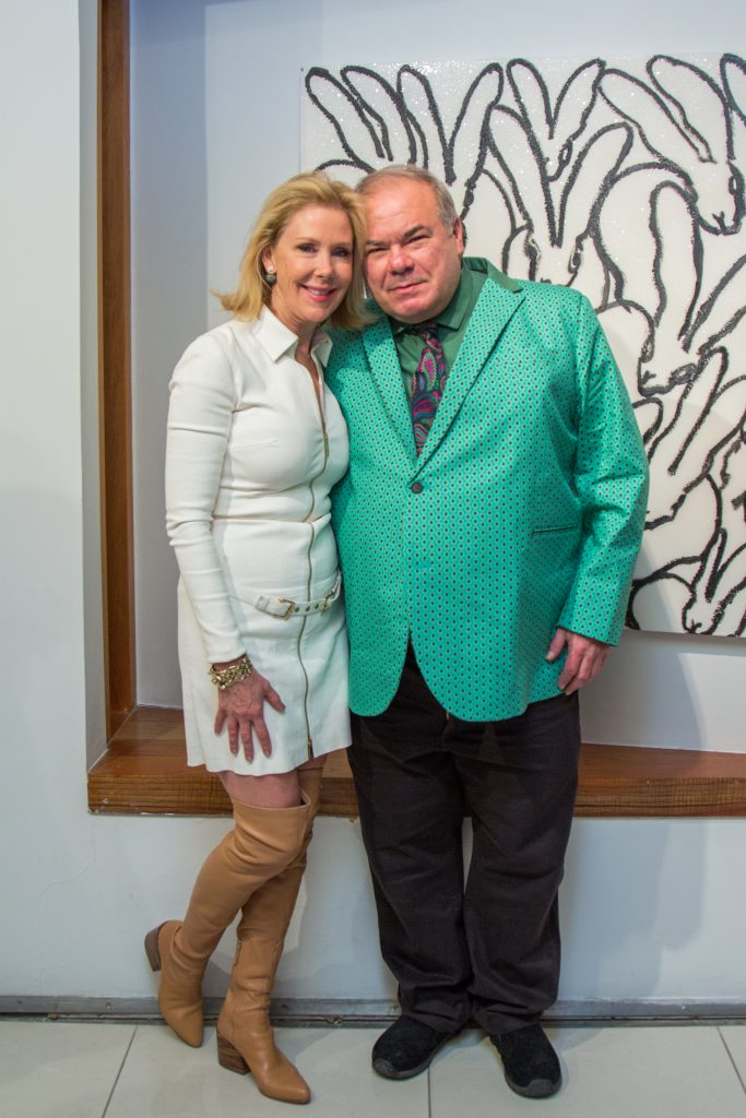 Laura Rathe and Hunt Slonem at the artist's opening and book signing at Rathe's eponymous Houston gallery,  2018. (Photo by Lizette Belen Soto)