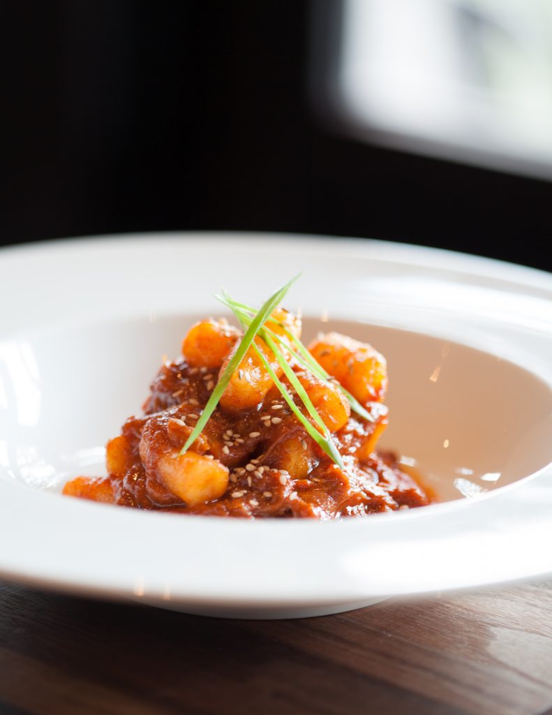Underbelly's famed Korean braised goat and dumplings can be found at The Hay Merchant. (Photo by The Hay Merchant.)