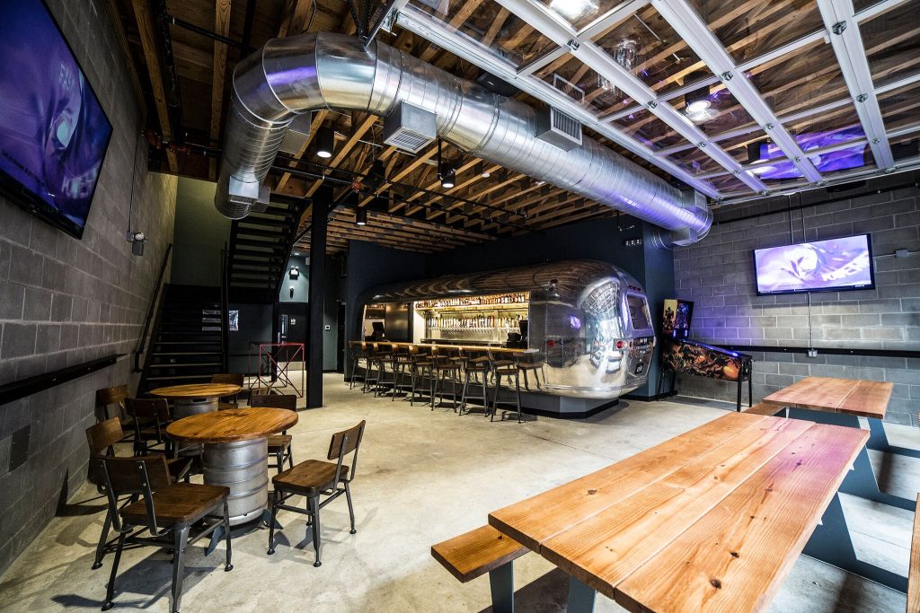 The full-service bar is built out of a restored vintage Airstream trailer. 