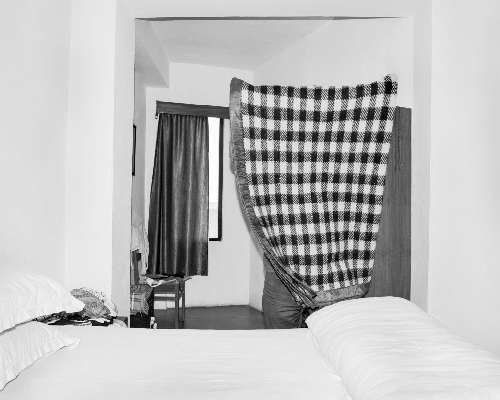 Tenzing Dakpa's "Arrival," 2016, from the series "The Hotel," at FotoFest