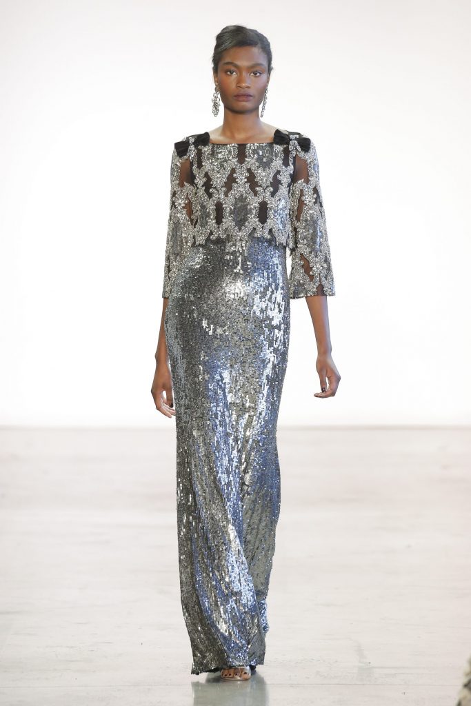 Badgley Mischka pewter tulle and sequined column gown with embellished bodice and sleeves.