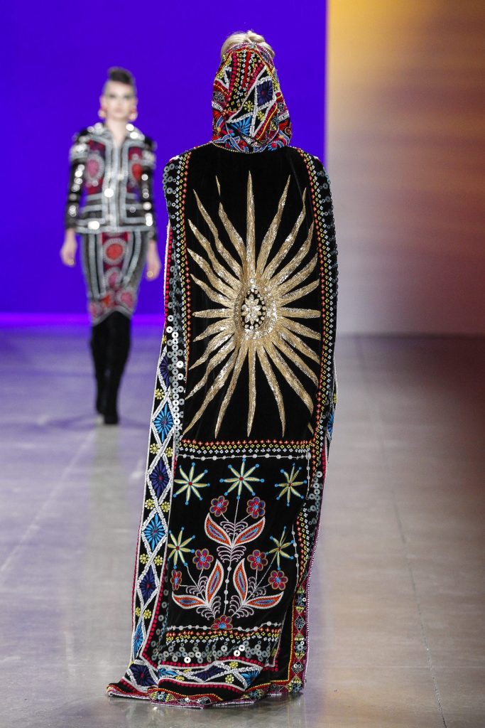 Naeem Khan  sequin and thread embroidered cape with satin bustier and velvet tear away pant (back view).