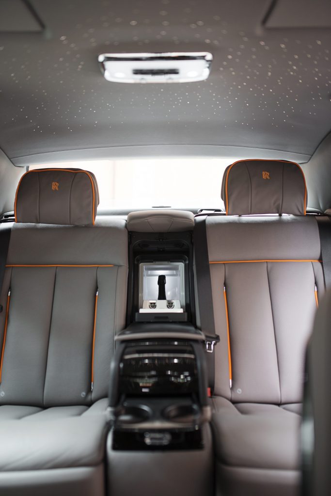 The car has a small cooler for champagne. 