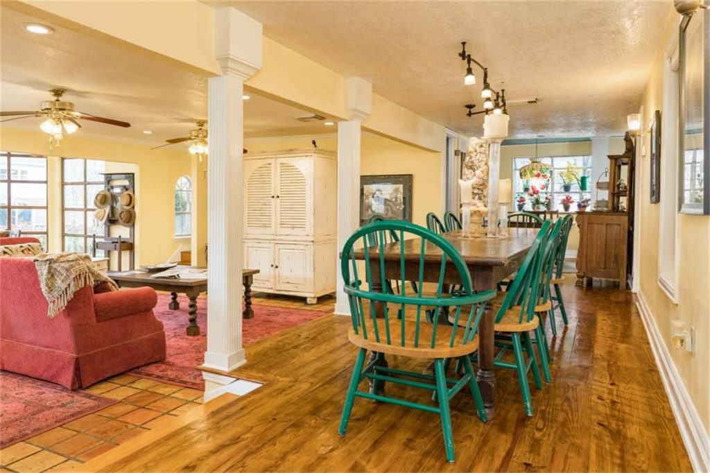 The spacious living room sports column details. 