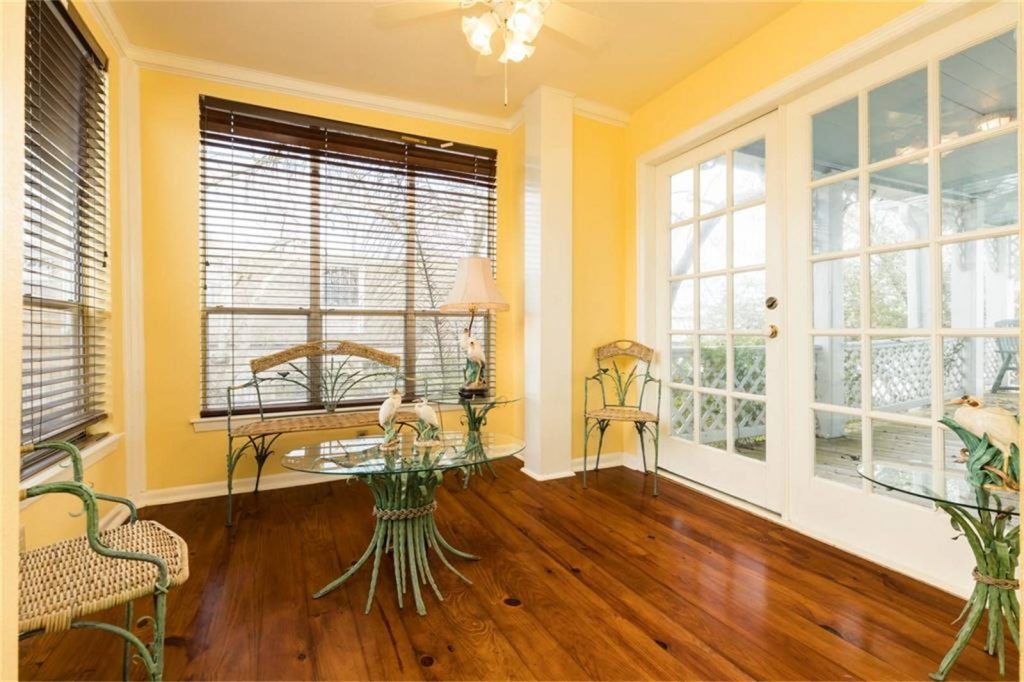 The house features classic wood floors. 