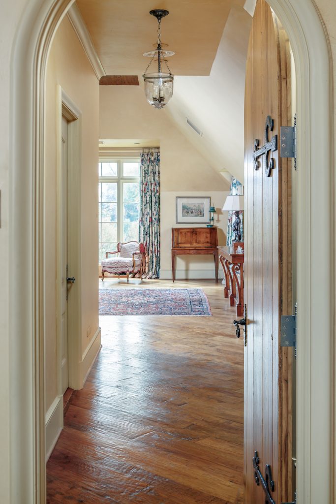 The house has four bedrooms, and an additional guest house. 