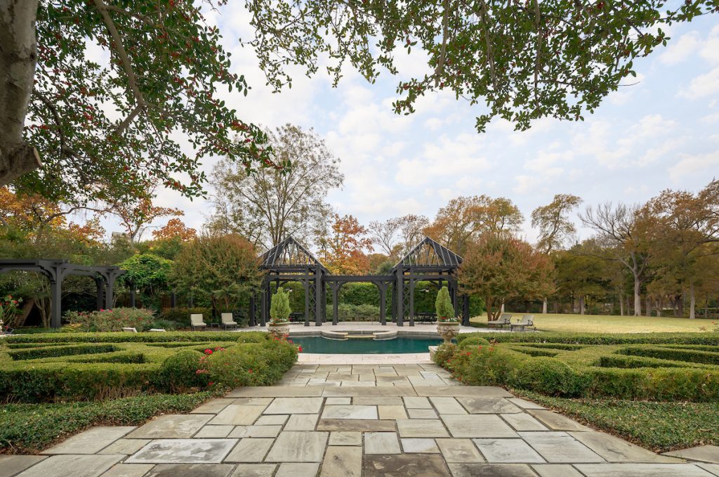 There's a pool with a spa and an outdoor kitchen for entertaining at 4906 Park Lane.