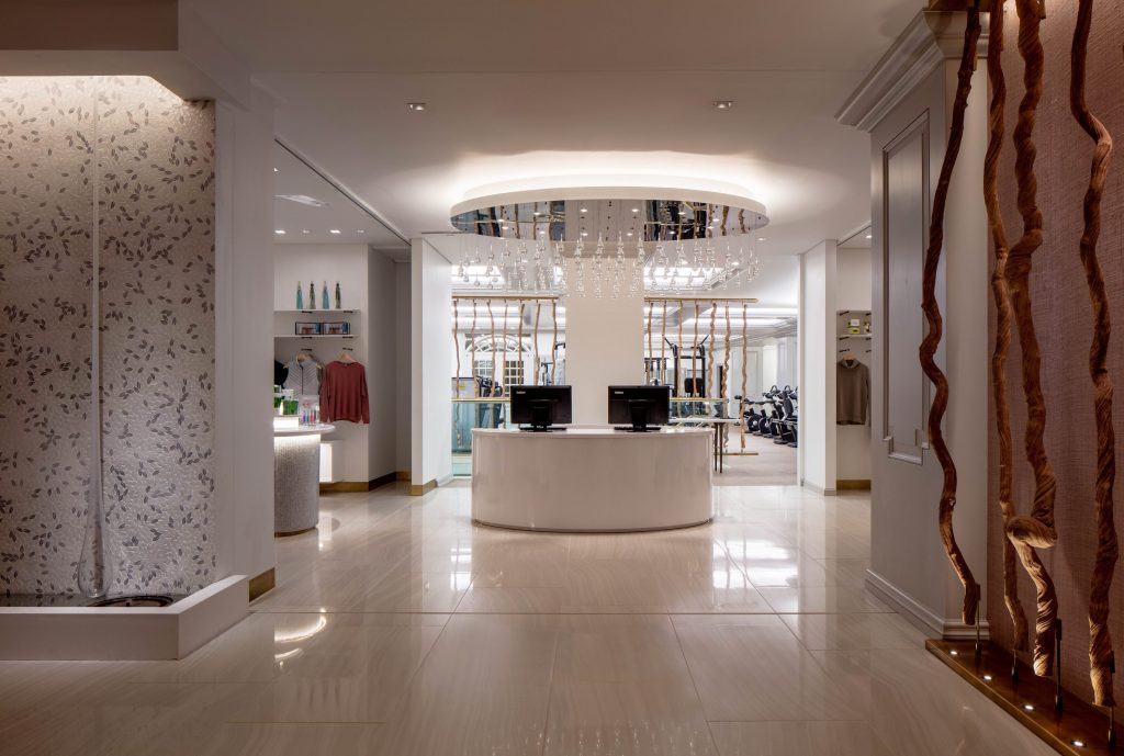 The retail area carries a small selection of beauty products and activewear. 