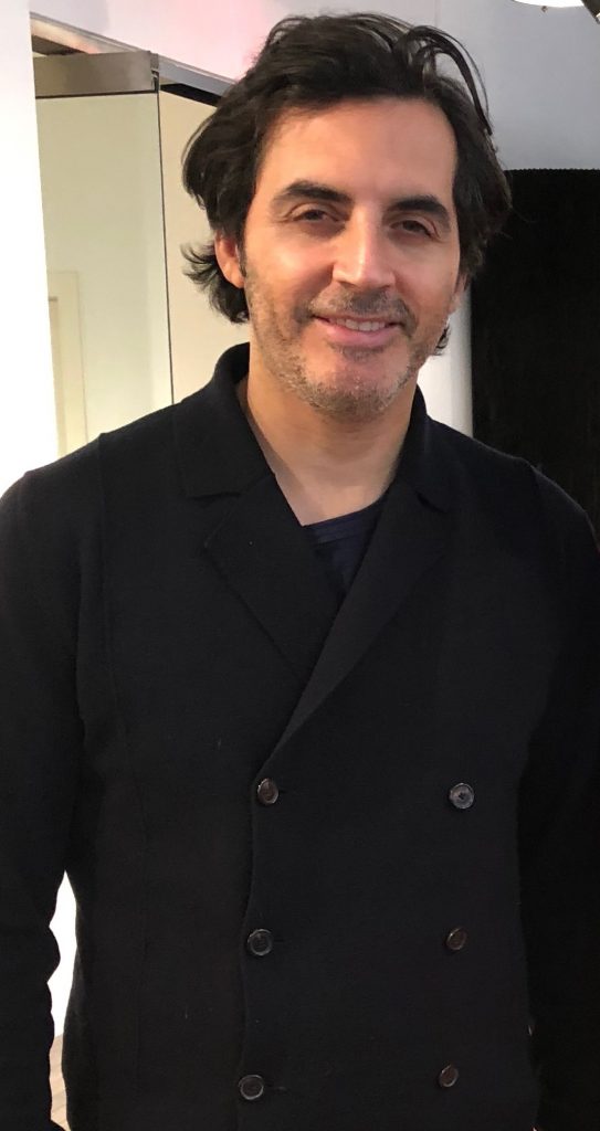 Yigal Azrouël is celebrating his 20th year in the fashion business.