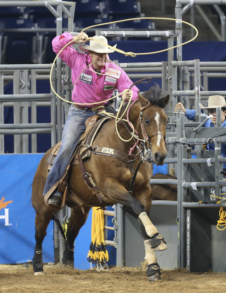 Tyson Durfey wears a pink shirt when he competes to raise awareness for cancer research. 