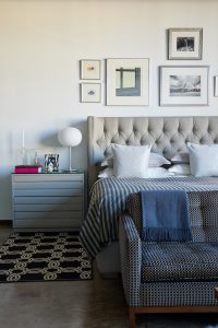 Vintage nightstands from Circa20c. Alice Cottrell-designed bed by Kisabeth. Artwork by English painter Bernard Farmer, Patrick Caulfield, Tony Latham, Doug Brightwell.