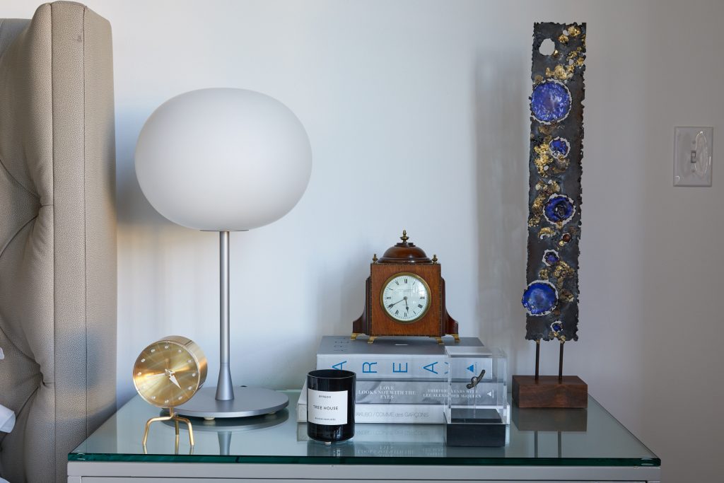 Jasper Morrison Glo Ball lamp for Flos. George Nelson Tripod clock for Vitra. Early-20th-century English mantel clock. James Bearden sculpture, circa 2007.