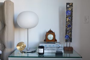 Jasper Morrison Glo Ball lamp for Flos. George Nelson Tripod clock for Vitra. Early-20th-century English mantel clock. James Bearden sculpture, circa 2007.