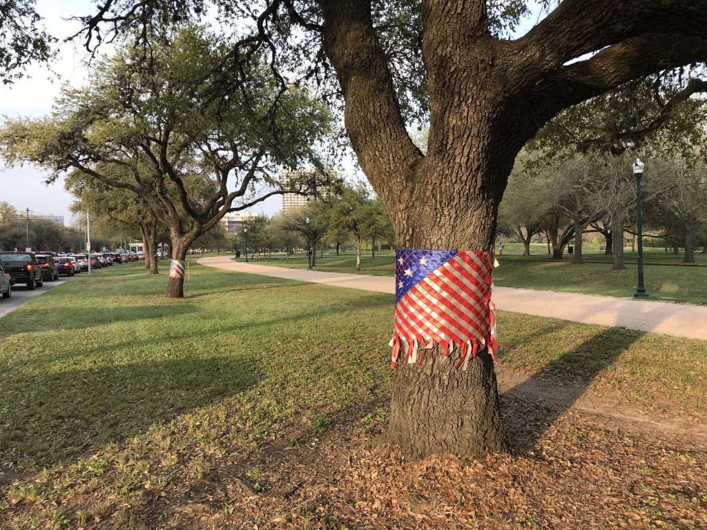 Colorful handwoven vests populate Hermann Park as part of the "Color Bursting" installation. The public artwork funded by HAA was created by community volunteers as well as students from YES Prep, and devised by Art Uniti's Tami Merrick and Nicola Parente.