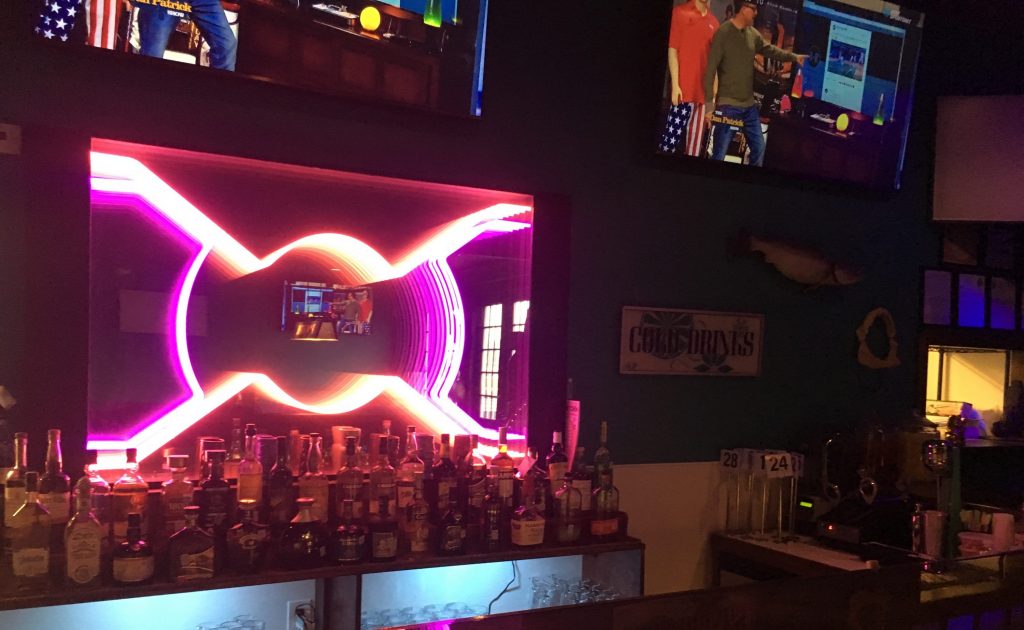 The original bar is fully stocked, but the daiquiri machines are at the main one. 