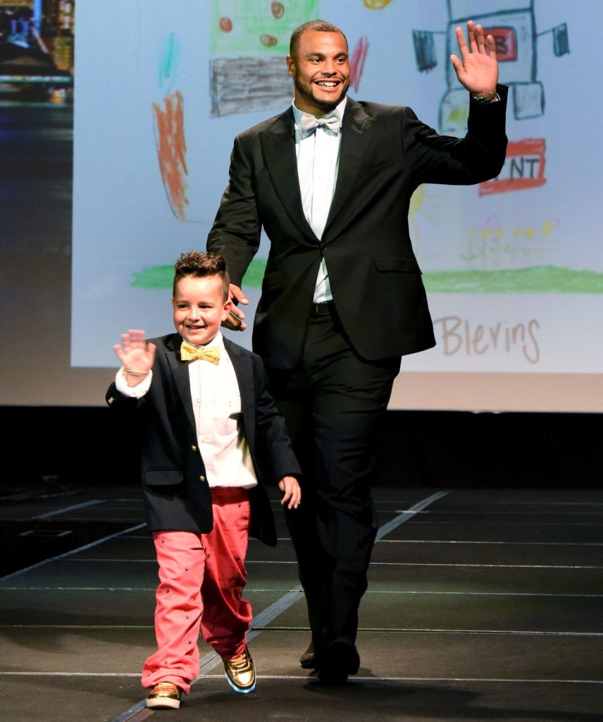 Cowboys star Dak Prescott participates in the CCF Gala 2017s fashion show fun; photo courtesy of CCF