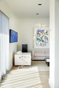 Brian Clarke’s "Water Lilies". Joan Mitchell’s diptych "Sunflowers II", 1992. James Surls’ "Untitled Sculpture", circa 2008. On stand, Ben Tyers’ "Breathe", 2009. Sofa and chair from estate of Starke Taylor.