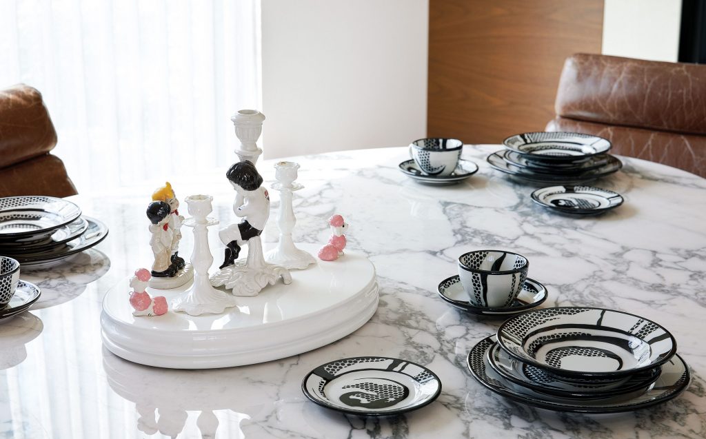 Roy Lichtenstein’s 60-piece "Dinnerware", 1966. Barford Barnaby’s ceramic sculpture "Its OK Dad, We’ll Look After the Dogs", 2008
