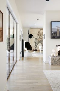 Paul Fryer’s air-raid-siren "Intempesta Nox", 2005, with Wolfe Von Lenkiewicz’s "Dora", 2009. Stereo Alpha egg chair and ottoman, circa 1970. In foreground, Stephen Hannock’s "New York Skyline", 1980. Mike Cunningham’s "Torso/Nautilus", 1989.