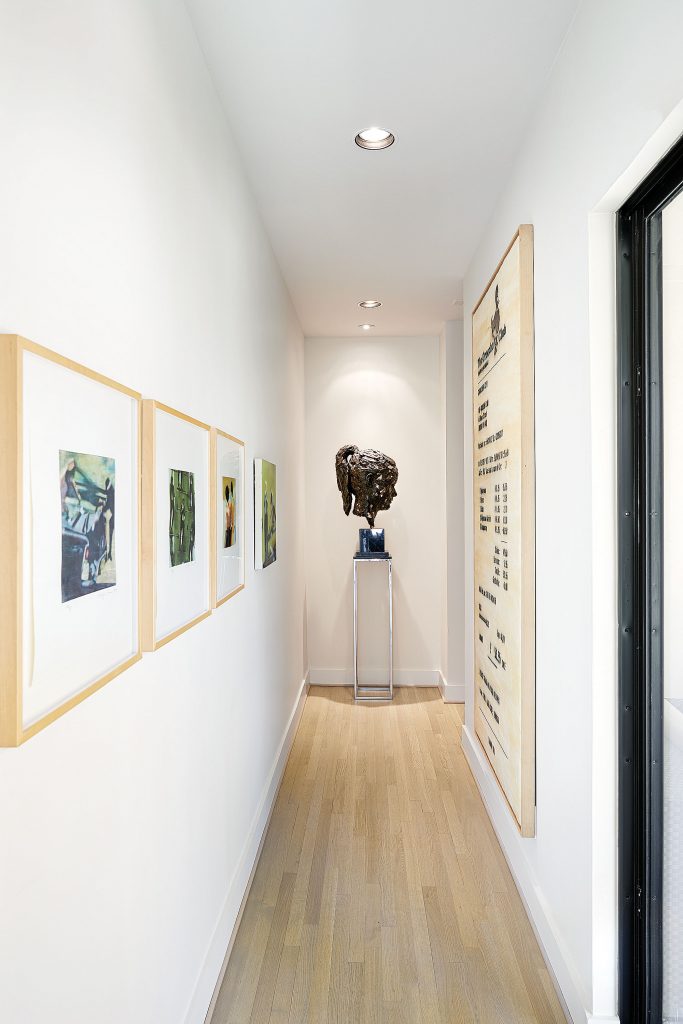 Kevin Francis Gray’s bronze sculpture "Louise", 2013, and to the left, Christopher Brown’s "Film Stills", 1994, and "Runner", 1994; Jose Maria Cano’s "The Groucho Club (We Are What We Pay For)", 2007.