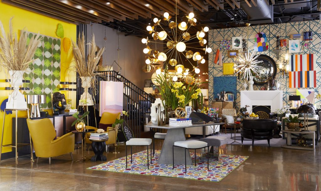 Arteriors showroom on Dragon Street featuring rugs from Clifton Carpets & Home, lighting and furniture from Arteriors, and artwork from Galleri Urbane.