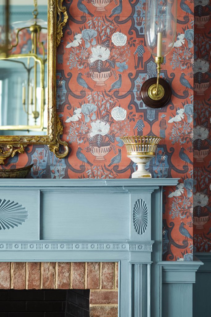 Antique mantelpiece carved in the Federal period and block-printed wallpaper in a Navesink River house (Photo Eric Piasecki)