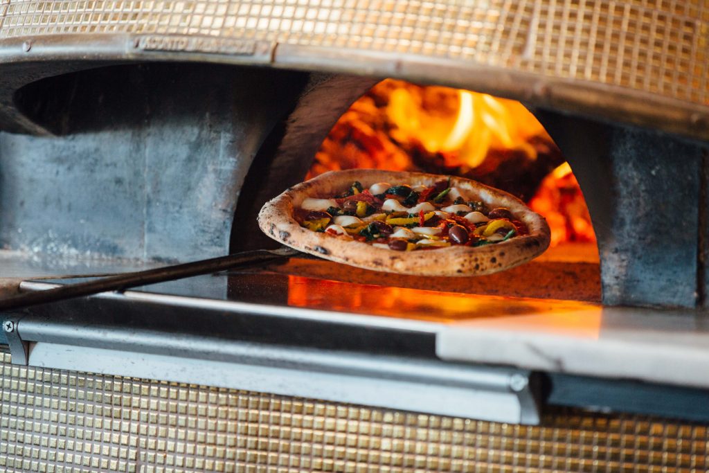 The pizzeria offers a wide range of signature pies. 