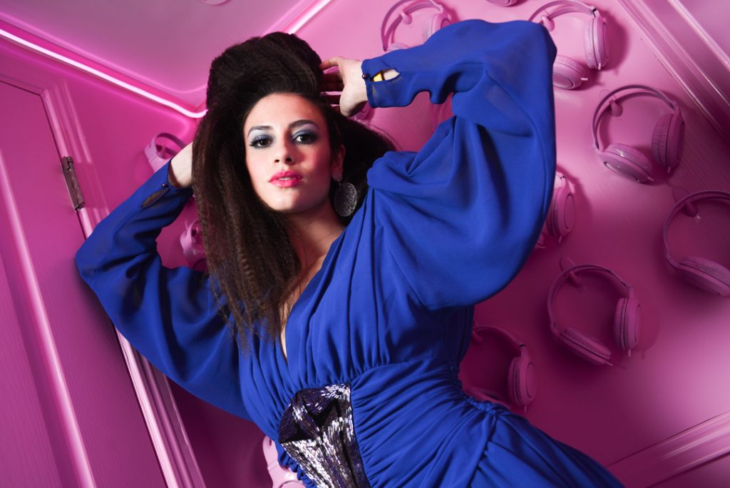 Model inside the mixtape bathroom