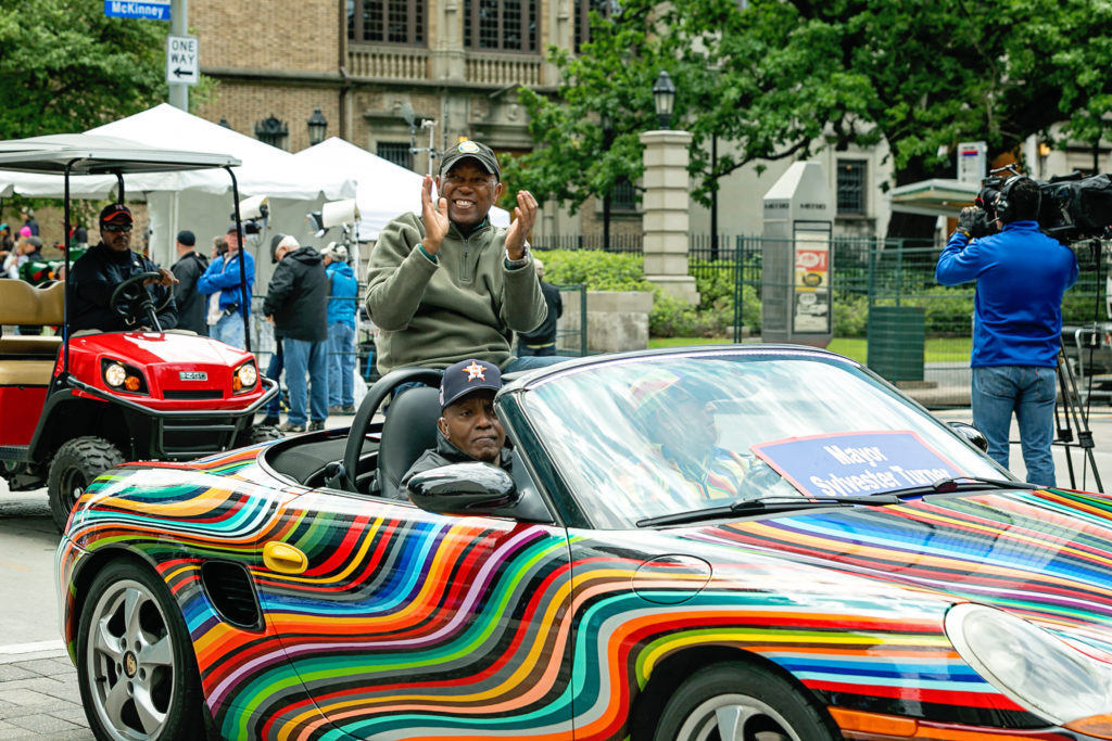 Mayor Sylvester Turner, here pictured in the first place winning "Aurora-Porshie-Alice" by Nicole Strine and Robynn Sanders from the 2018 Art Car Parade, will be on the debut episode of "The Houston Hour with Mister McKinney and Catherine Anspon" Thursday, August 29, from 3 to 4 pm. (Photo by Emily Jaschke)